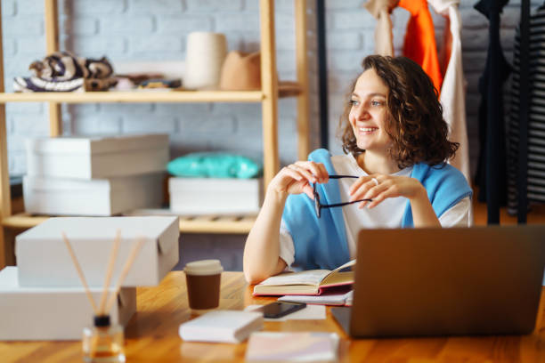 istock Dropshipping business owner working in her office. 1370766172