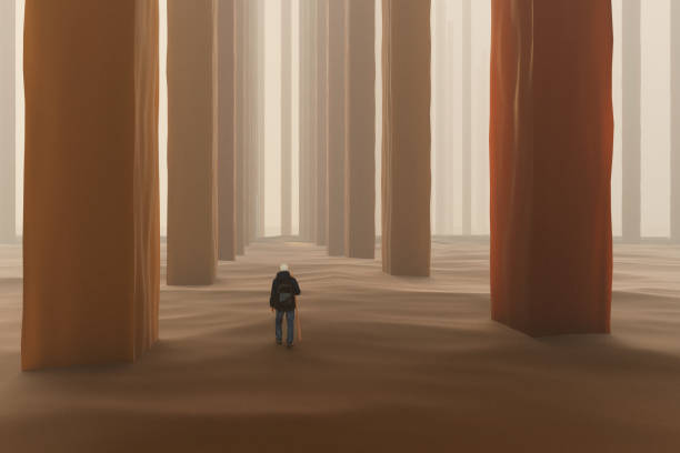 istock Walking man in surreal desert 1370769845