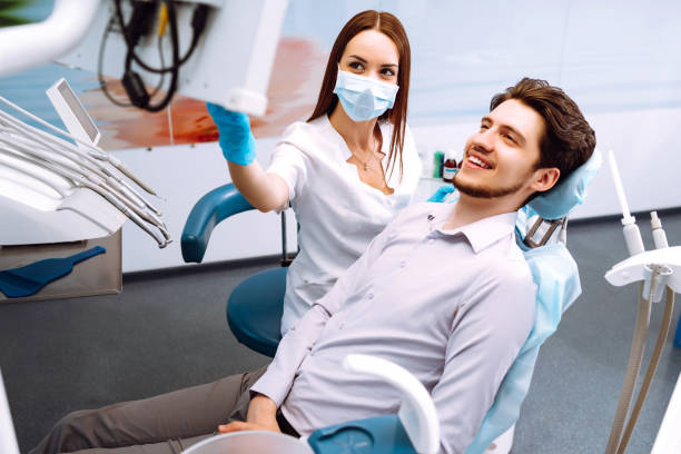 istock Man having a visit at the dentist's. 1370770457