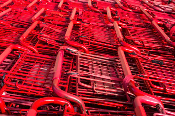 istock Rows Of Red Shopping Carts 1370771414