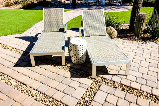 istock Reclining Lounge Chairs On Paver Patio 1370771703