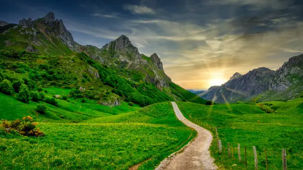 Photo of Track and mountains in Valle del Lago, Somiedo Nature Park, Asturias, Spain