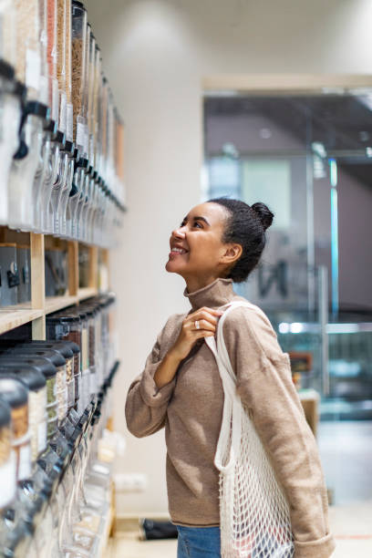 istock Young African woman shopping in zero waste store 1370773785