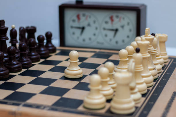 istock The start of a chess game,  first pawn move. 1370784475