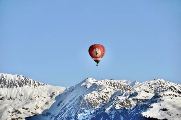 Hot air balloon over over snowcapped mountains Hot air balloon of k2 hotel collections Courchevel flying over Mont Blanc mountain, the highest of Europe. savoie photos stock pictures, royalty-free photos & images