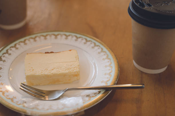istock Cheesecake and coffee in a cafe. 1370789759