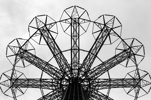 Low Angle View of Parachute Jump in BW