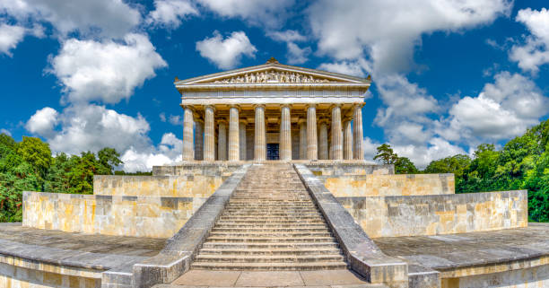 Walhalla Front view of the Walhalla Memorial with its circumferential, Greek-style colonnade and the staircase in the foreground, near Regensburg, Bavaria stitched image stock pictures, royalty-free photos & images