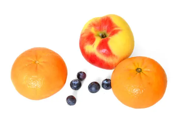Photo of Fruits and berries (apple, tangerines and blueberries)