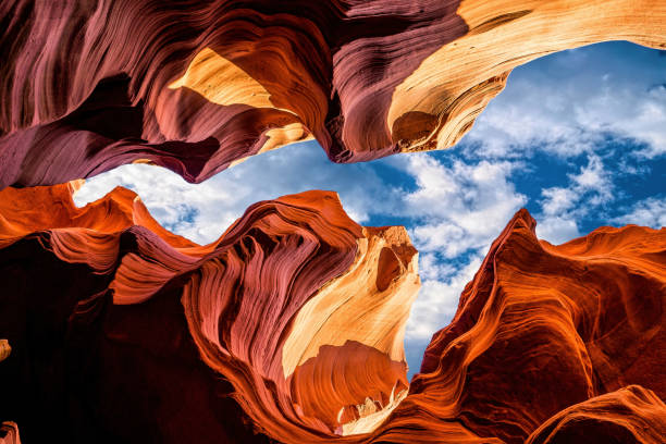 Sandstone cliffs in Antelope Canyon, Arizona Sandstone rock erosion. Picturesque red cliffs in Lower Antelope Canyon in Arizona, USA. Famous tourist attraction rock formation stock pictures, royalty-free photos & images