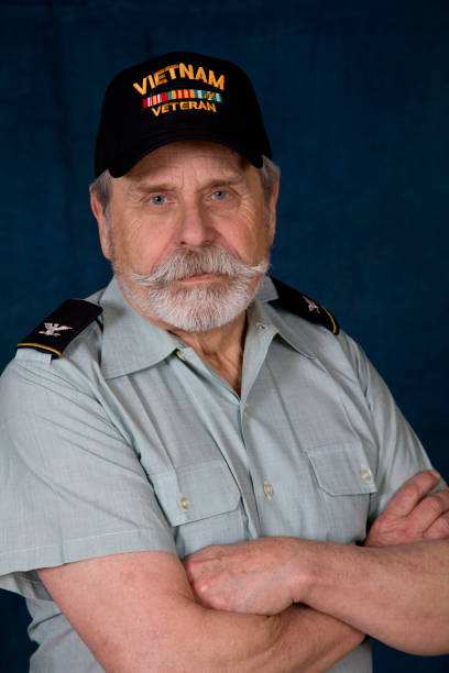 istock Retired Army Colonel Vietnam Veteran arms crossed looking at camera 1370801816
