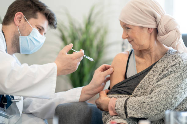 Cancer Patient Receiving a Vaccine stock photo