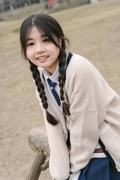 istock A young girl resting on the grass 1370802944