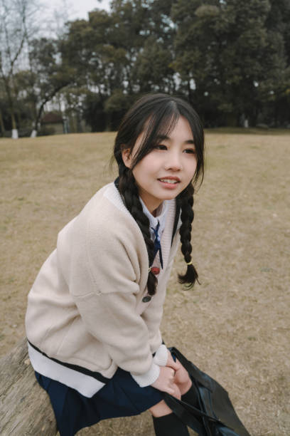 istock A young girl resting on the grass 1370802949