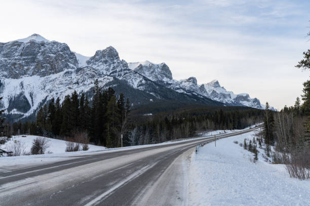 istock Alberta Highway 742 Three Sisters Parkway in winter. Canmore, Alberta, Canada. 1370810418