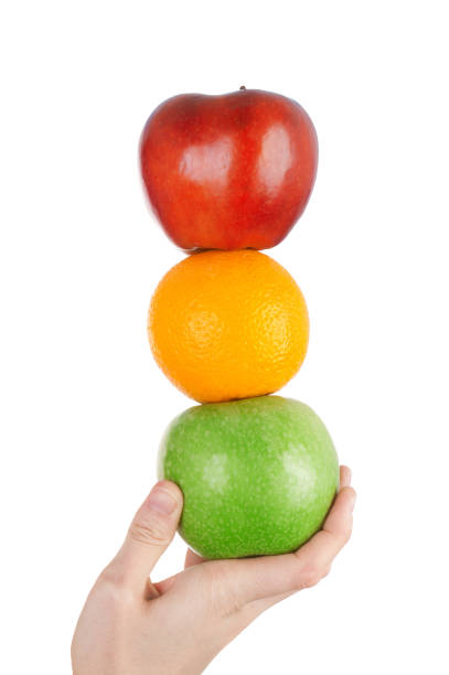 istock Hand holding fresh fruits on white background 1370812163
