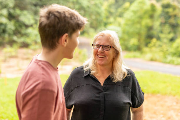 istock Mother talking with her teenage son 1370814637