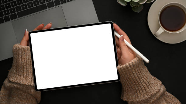 istock Female graphic designer sketching on digital tablet 1370816589