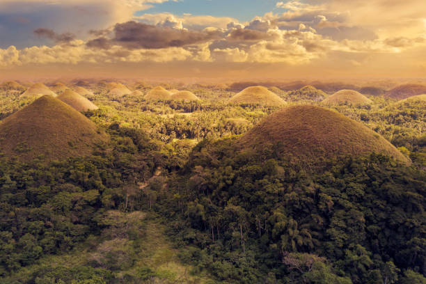 Dramatic afternoon aerial of Chocolate Hills in Bohol. Dramatic afternoon aerial of Chocolate Hills in Bohol. chocolate hills photos stock pictures, royalty-free photos & images