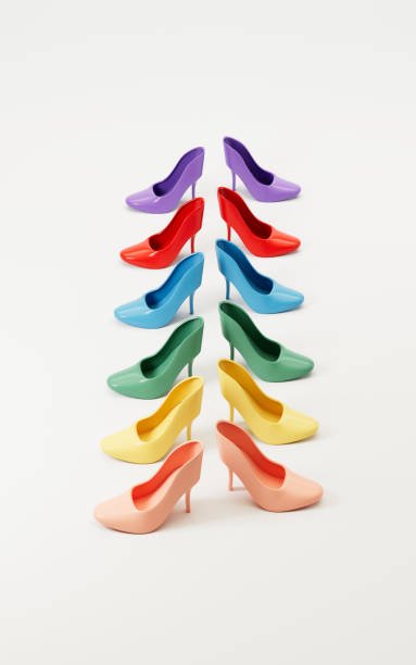 istock Many high-heeled shoes with white background, 3d rendering. 1370827813