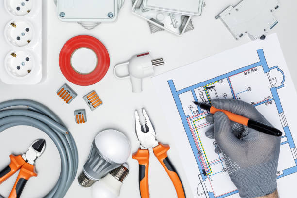istock Man repairing electrical system in house or office. electrician checking electric scheme. 1370830946