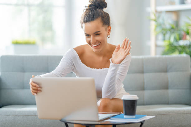istock woman working on laptop at home. 1370831122