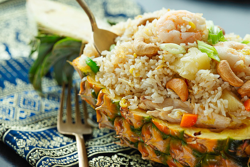 Shrimp and vegetable fried rice on table setting