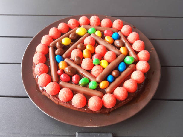 istock Colorful candy-topped chocolate cake 1370833273