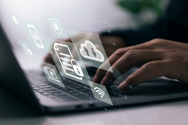 istock Concept of data protection with a person who is using a laptop computer. 1370835373