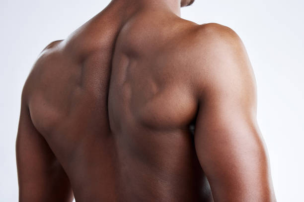 istock Cropped shot of an unrecognizable musclar man posing in studio against a grey background 1370836352