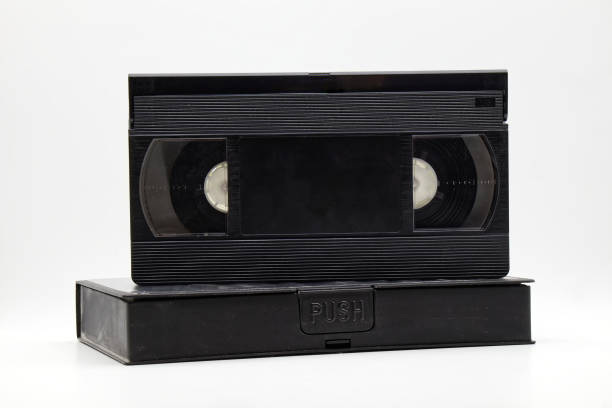 istock Vintage VHS video tape cassette with plastic cassette box. Retro style technology from the 90s 1370837192