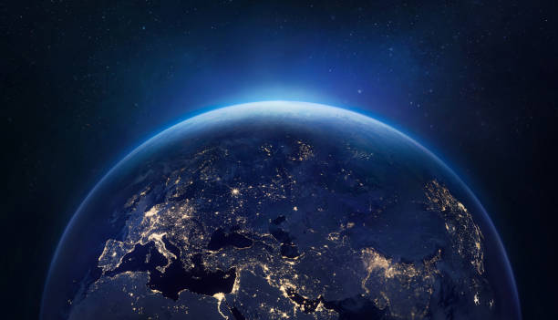 istock Earth planet in deep space. Space wallpaper with Earth at night with cities lights. Elements of this image furnished by NASA (url: https://eoimages.gsfc.nasa.gov/images/imagerecords/79000/79765/dnb_land_ocean_ice.2012.3600x1800.jpg) 1370838389