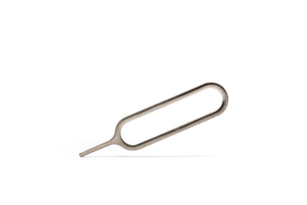 istock Closeup metal cell phone needle white background 1370839868