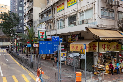 Hong Kong - February 15, 2022 : Hong Kong Street Scene in Wan Chai Road and Tin Lok Lane.