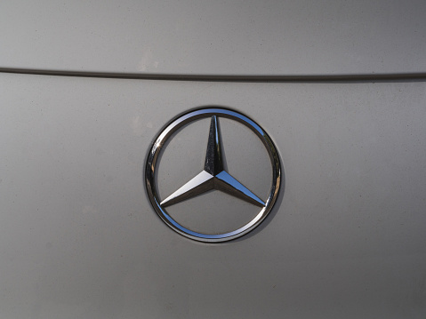 Marbella, Spain - January 31, 2022: Close up image of Mercedes-Benz car logo. Mercedes-Benz is a global automobile manufacturer