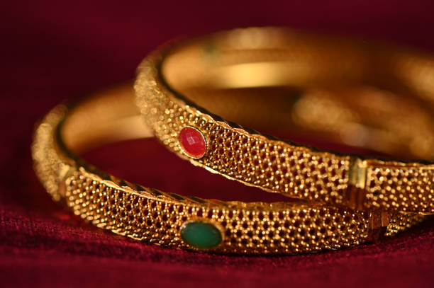 Close-Up Of Bangles Over White Background