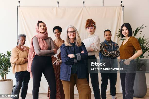 International Womens Day Portrait Of Multi Ethnic Mixed Age Range Women Looking Confidently Towards Camera Stock Photo - Download Image Now