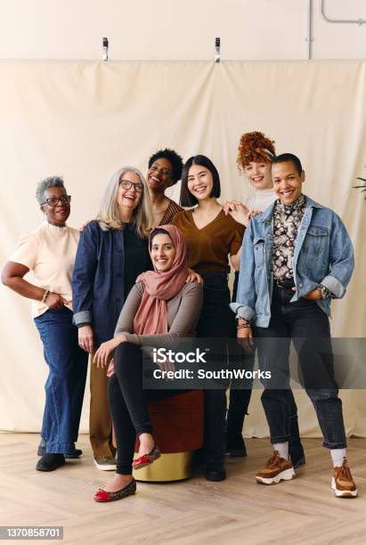 Portrait Of Mixed Age Range Multi Ethnic Women Smiling In Celebration Of International Womens Day Stock Photo - Download Image Now