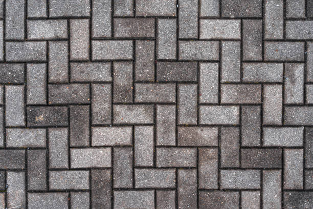 istock Stone pavement with abstract pattern closeup. crumble with age. construction, repair. concept of destruction, decline. High quality photo 1370860906