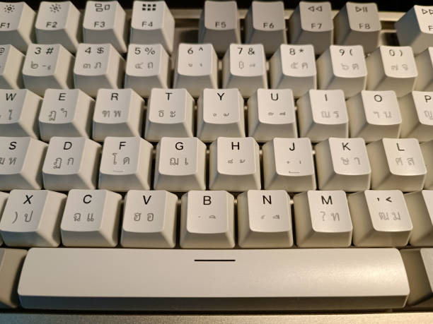 New white computer keyboard background with Thai and English languages