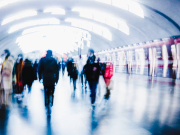 istock Blurry image of a platform with passengers waiting for the train. 1370863139
