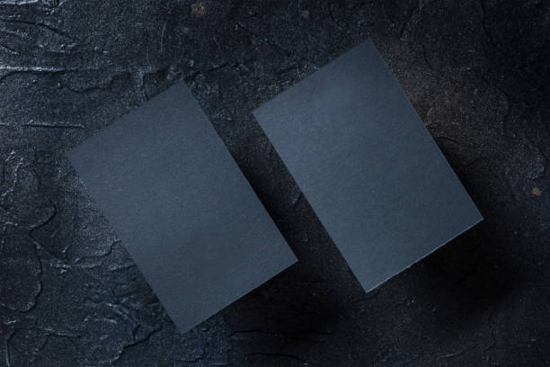 istock Black business card mock-up on a dark background, a template 1370863345