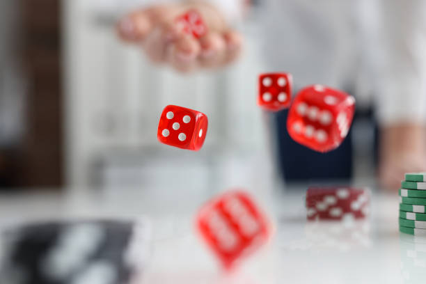 istock On the table are red dice and green casino chips 1370865991