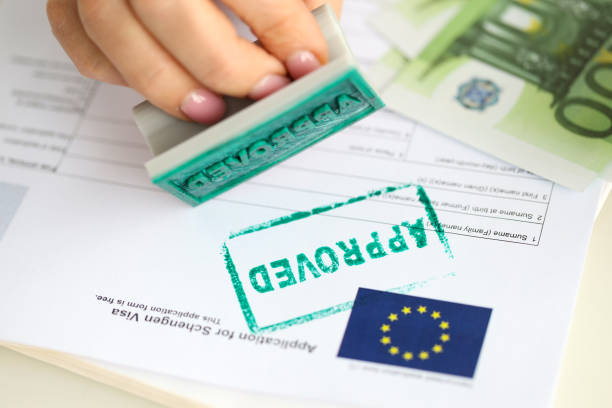 istock Stamp approved on a document for a visa to Europe 1370866002
