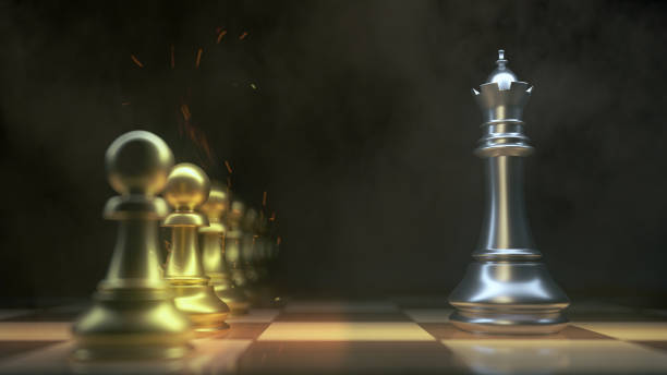 istock Chess pieces.Gold king winner surrounded with silver chess pieces on chess board game competition.concept strategy, leadership and success business. Tense atmosphere. 1370875234