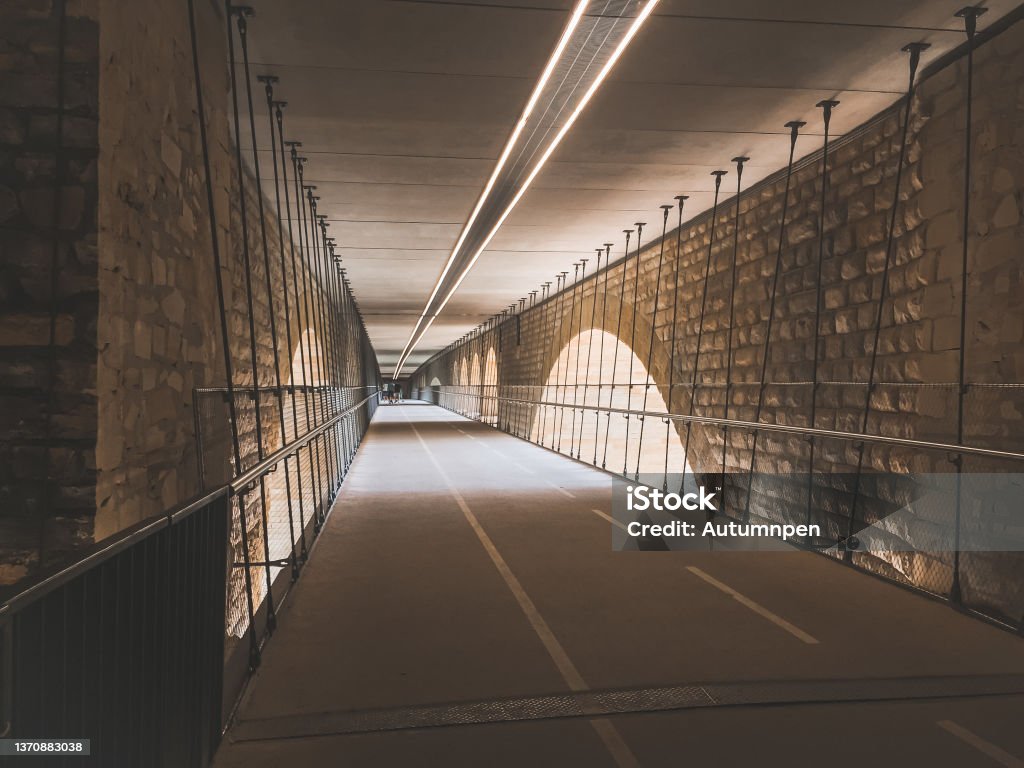 Cycle and walking track Under the Adolf Bridge in Luxembourg Cycling and walking track Under the Adolf Bridge in Luxembourg Luxembourg City - Luxembourg Stock Photo