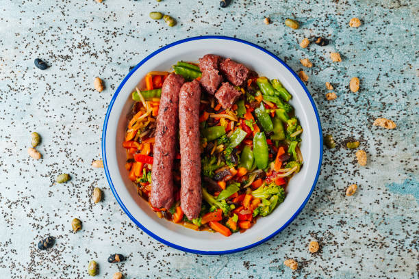 istock veggie sausages and grilled vegetables 1370883752