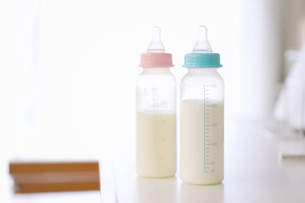 istock Milk in a baby bottle for twin babies 1370883885
