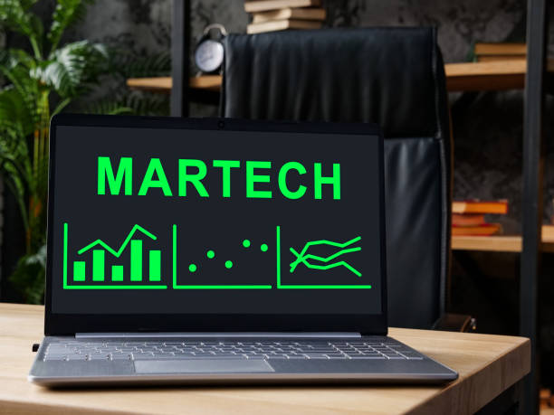 An Open laptop with MarTech Marketing technology data. stock photo