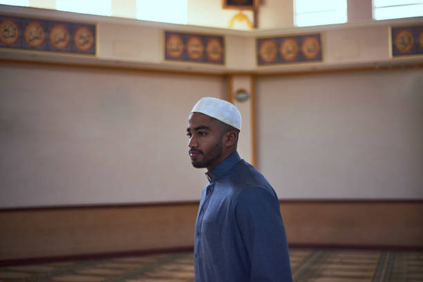 istock A candid shot during prayers at a mosque of a young man 1370886547